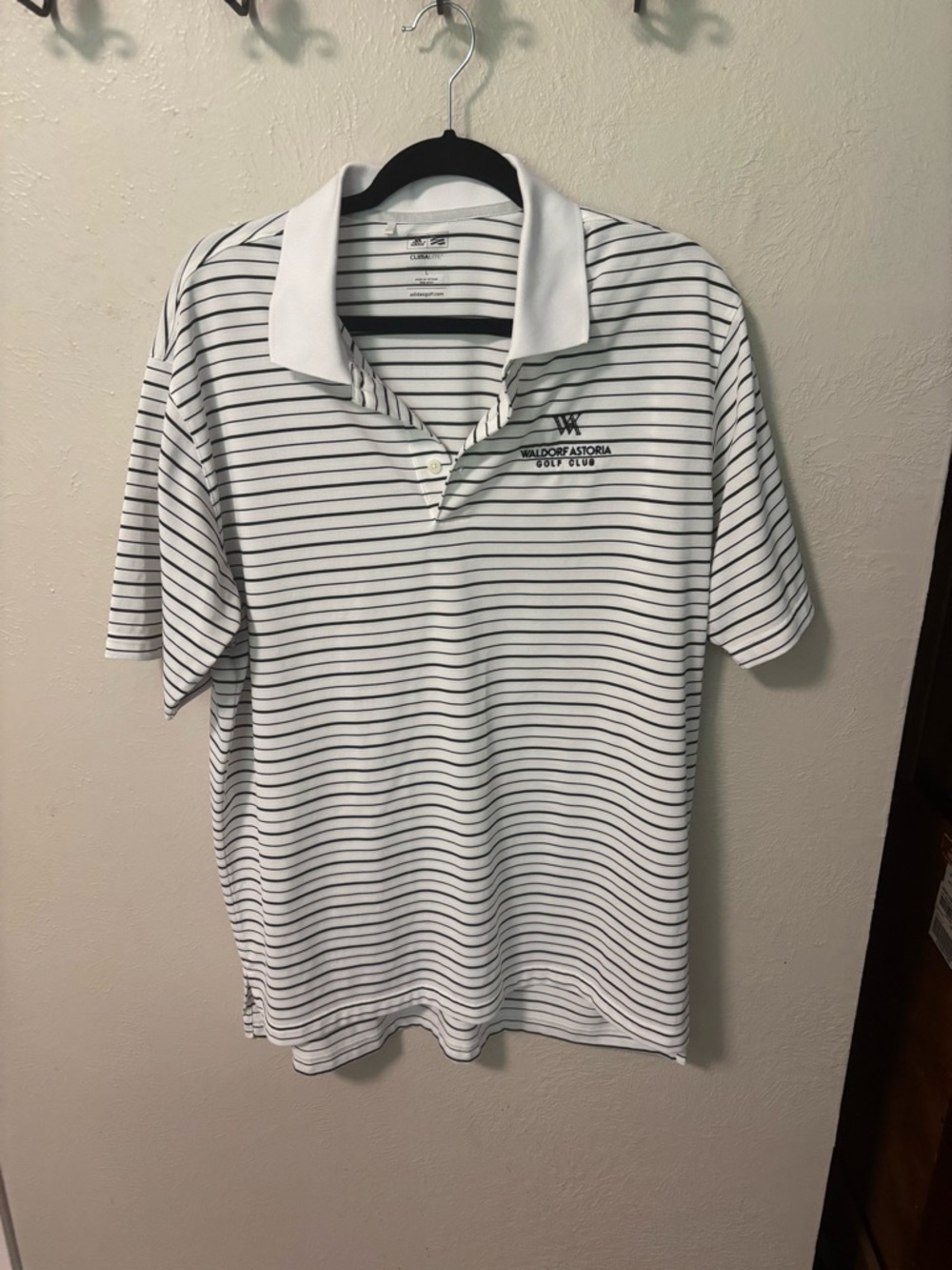 Adidas  White Polo Golf Shirt with Thin Black Stripes. Waldorf Astoria Golf Club